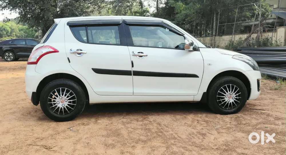 Maruti Suzuki Swift 2016 Lxi Optionel