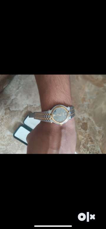 Gucci watches olx hot sale