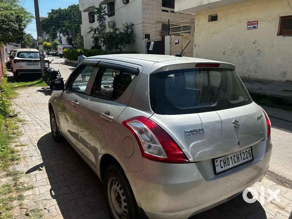 “swift Lxi 2015 – Brand New Feel, Driven With Care!”