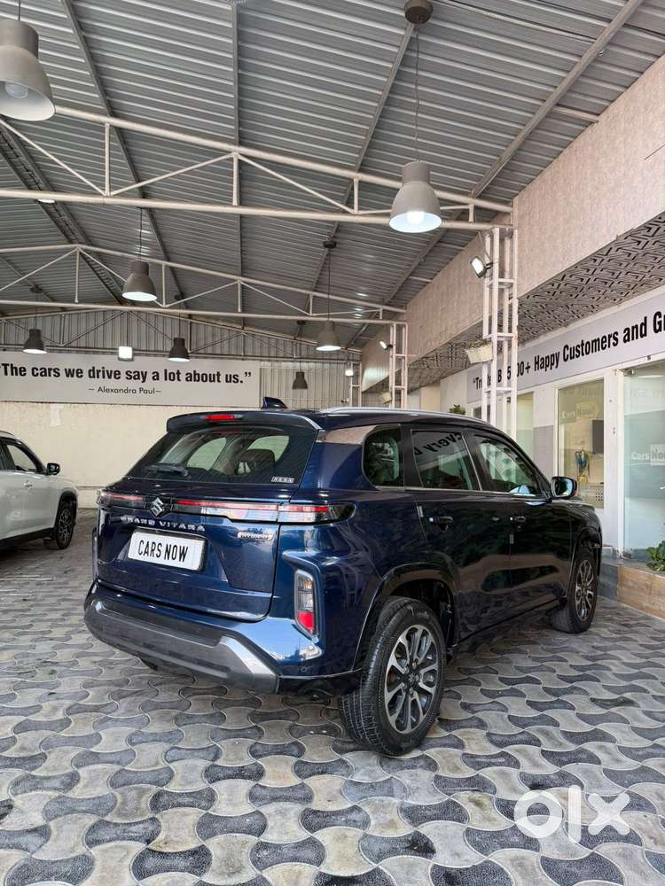 Maruti Suzuki Grand Vitara 1.5 Zeta Plus Dual Tone Intelligent Hybri..