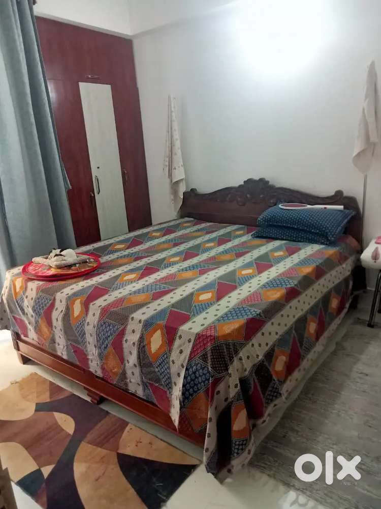 King Size Solid Wooden Bed with Storage & Carved Headboard | ₹25,000