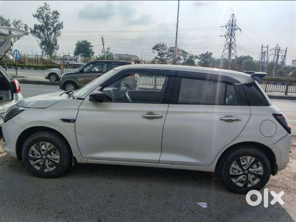 Maruti Suzuki Swift 1.2 Lxi (o), 2024, Petrol
