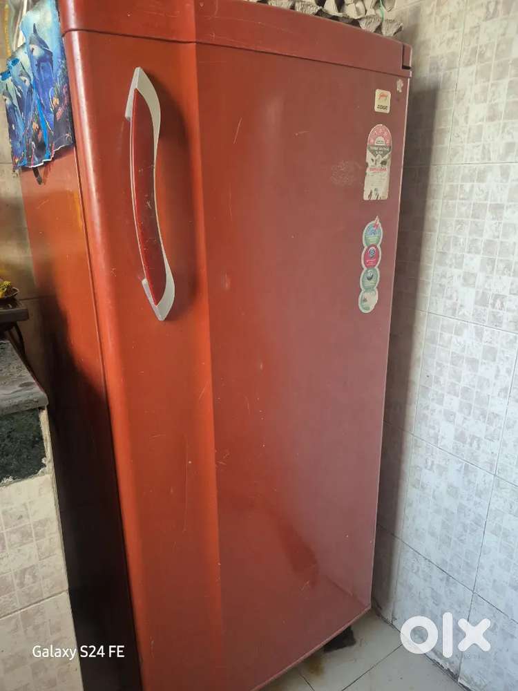 Godrej Red coloured best condition fridge
