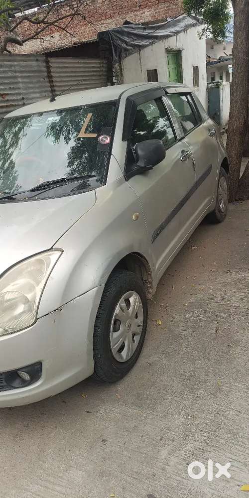 Swift Lxi 2006 Km Driven