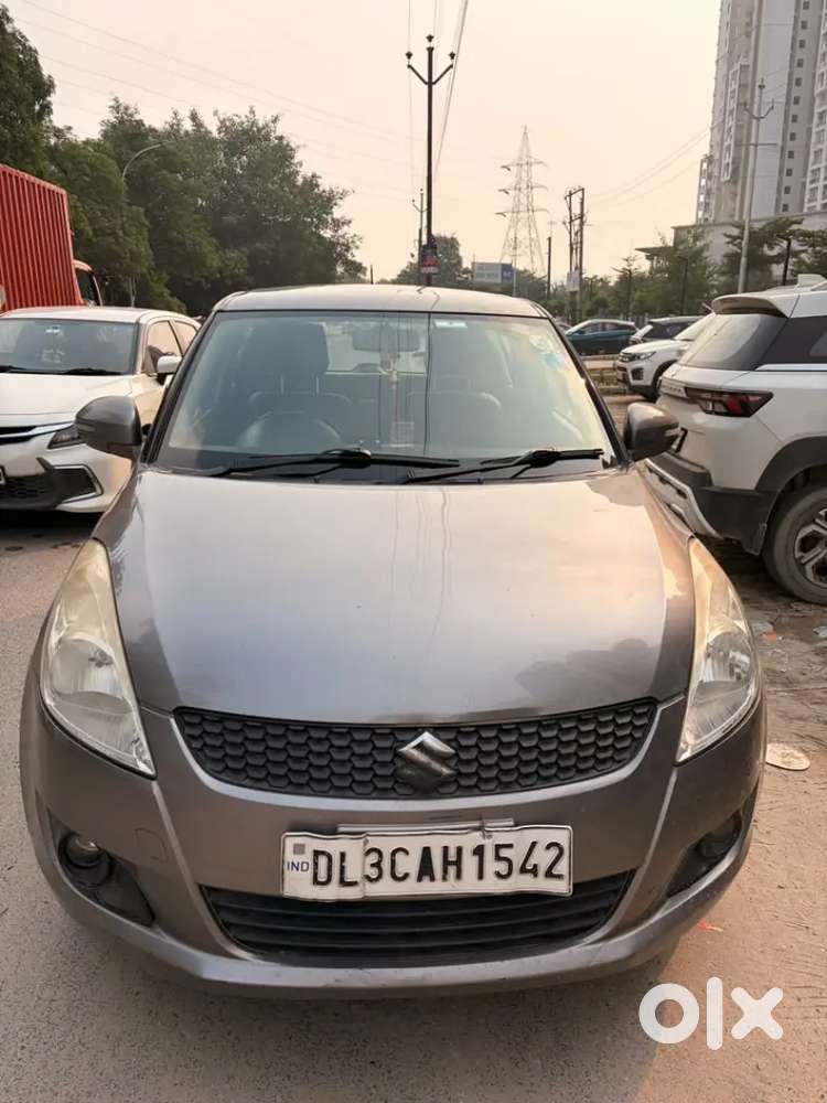 Maruti Suzuki Swift Vxi 2014.