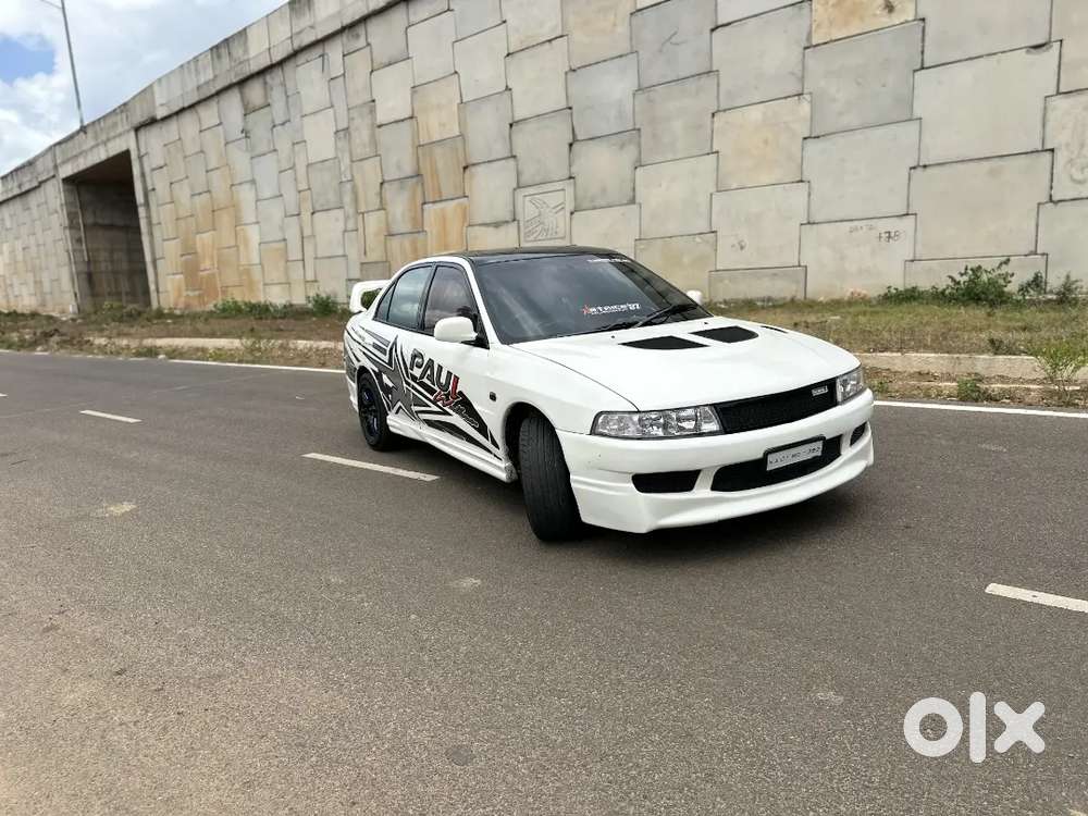 #lancer  
Petrol Manual 2002 Model

 Ownership : 4th Owner
 Km D