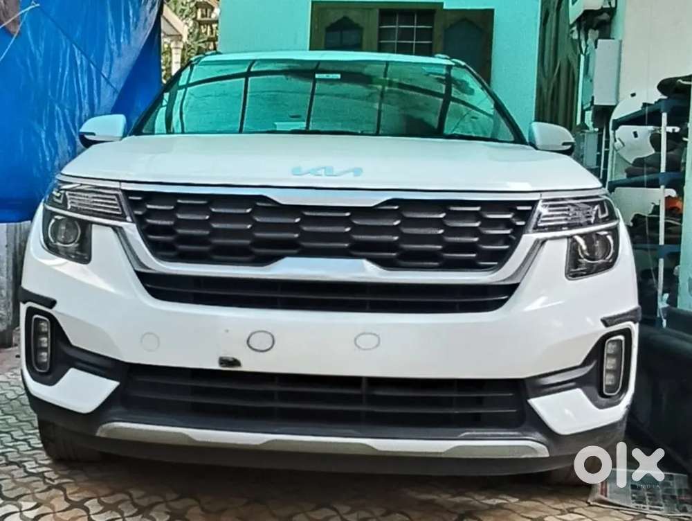 Milky White Kia Seltos Imt '22 Petrol 14000 Km Driven