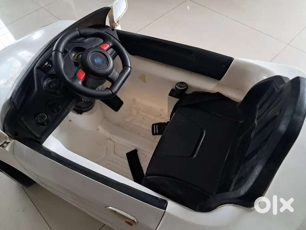 Kids electric car with remote - Photo 3