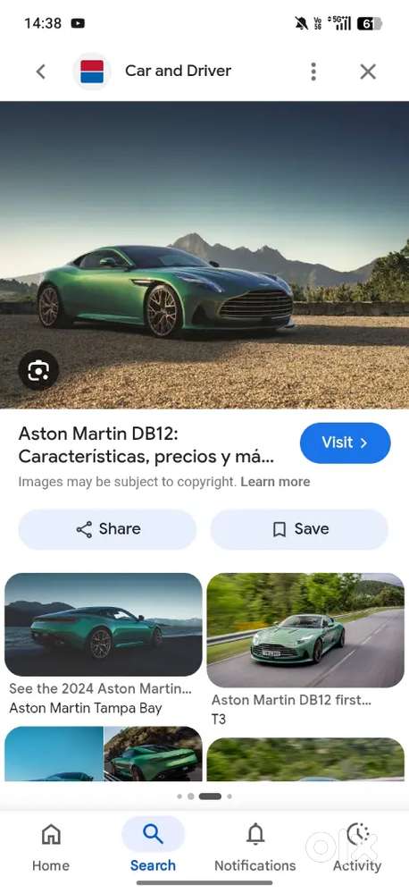 The Car Is Of Green Colour With All Features As New