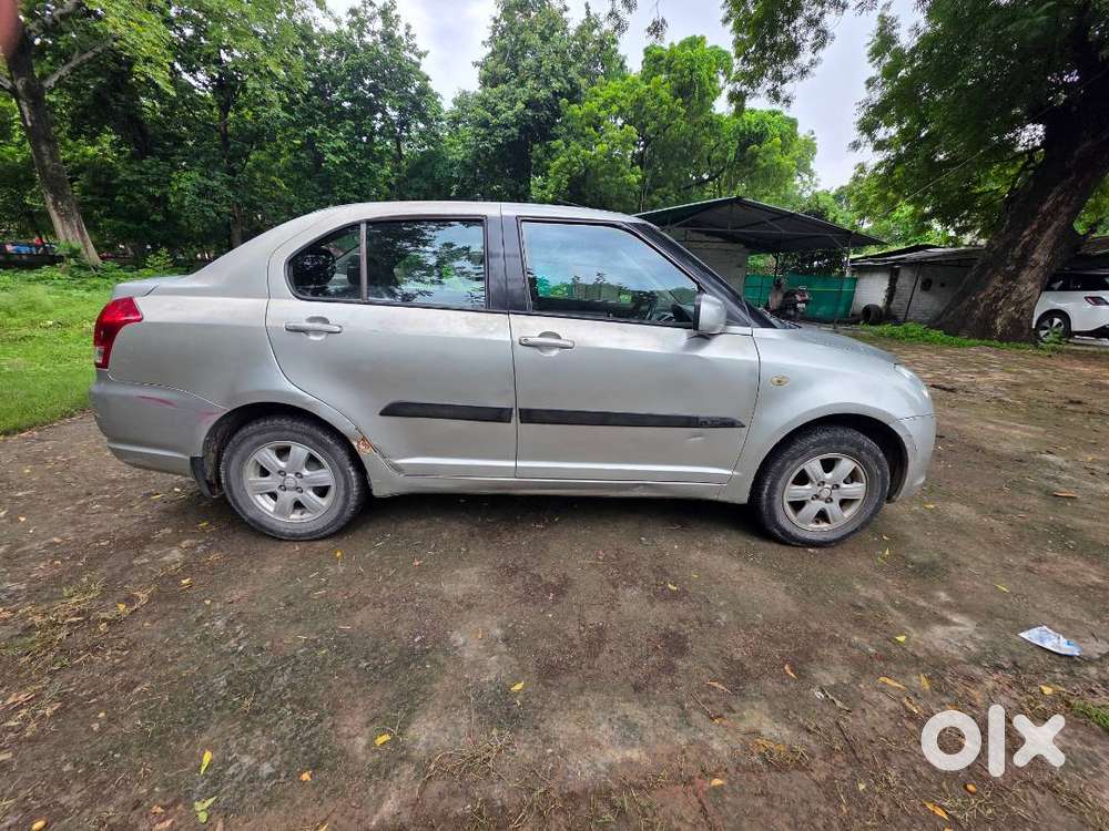Maruti Suzuki Dzire-2010-first Owner-silky Silver