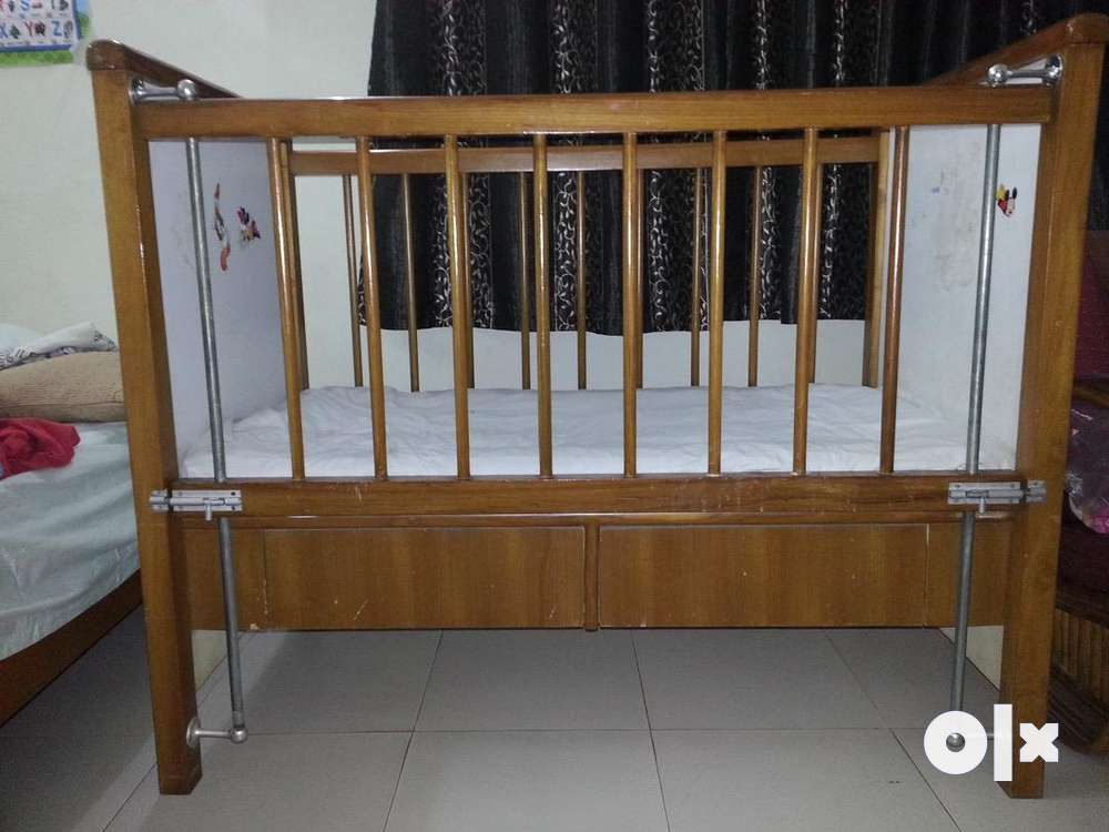 Olx cheap baby cot