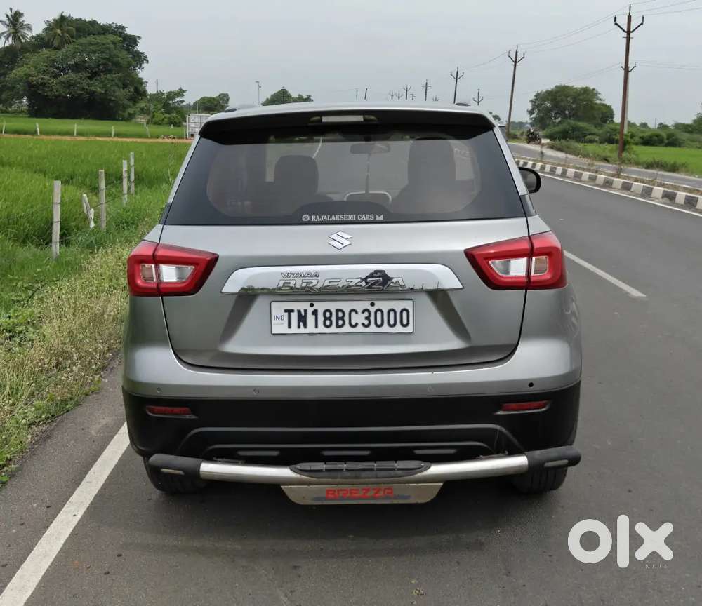 Maruti Brezza Silver Vxi 2021  Vip Number 3000  36k Driven