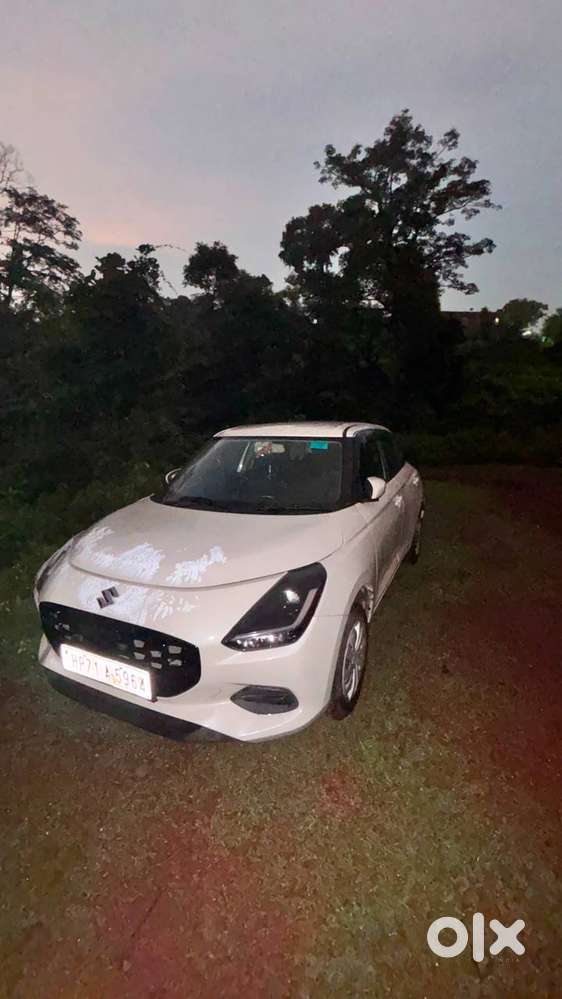 Maruti Swift Vxi Optional 2024