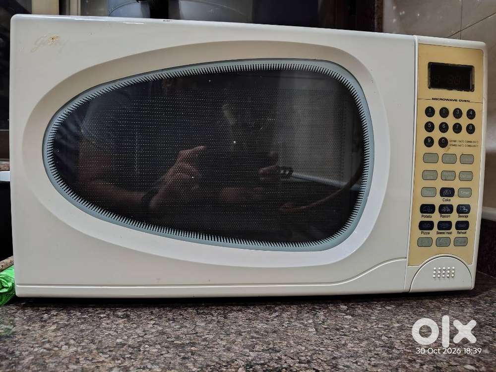 30 litre convection Godrej Microwave (display not working, auto on)