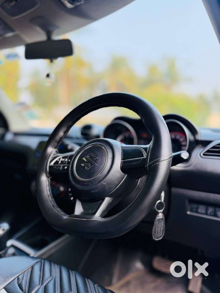 Maruti Suzuki Swift 1.2 Vxi (o), 2023