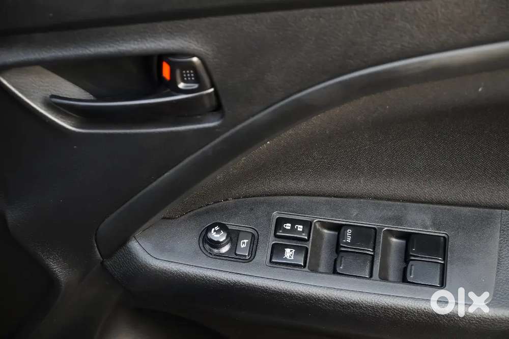 2025 Brezza Vxi Auto