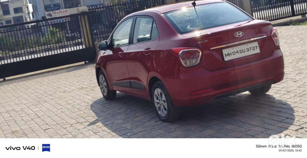 Red Colour Hyundai Xcent 2015 Petrol In Very Good Condition