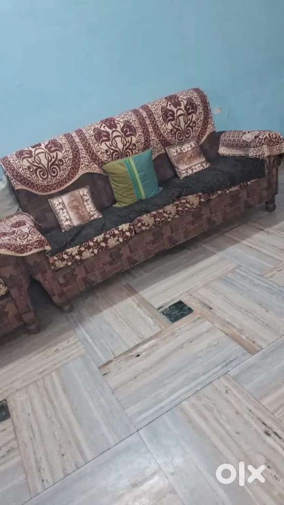 3 persons sitting sofa