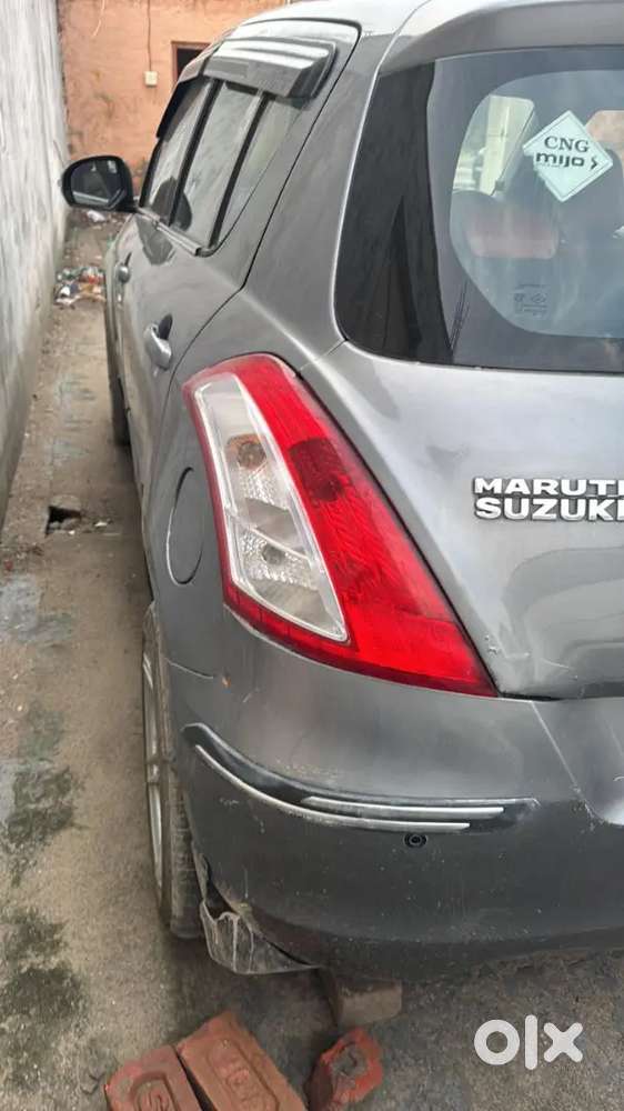 Maruti Suzuki Swift Lxi 2014