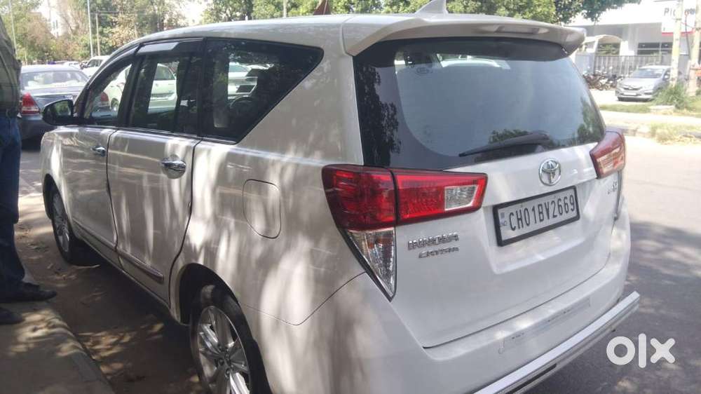 Innova Crysta ,white,top Model,2.8,z,at