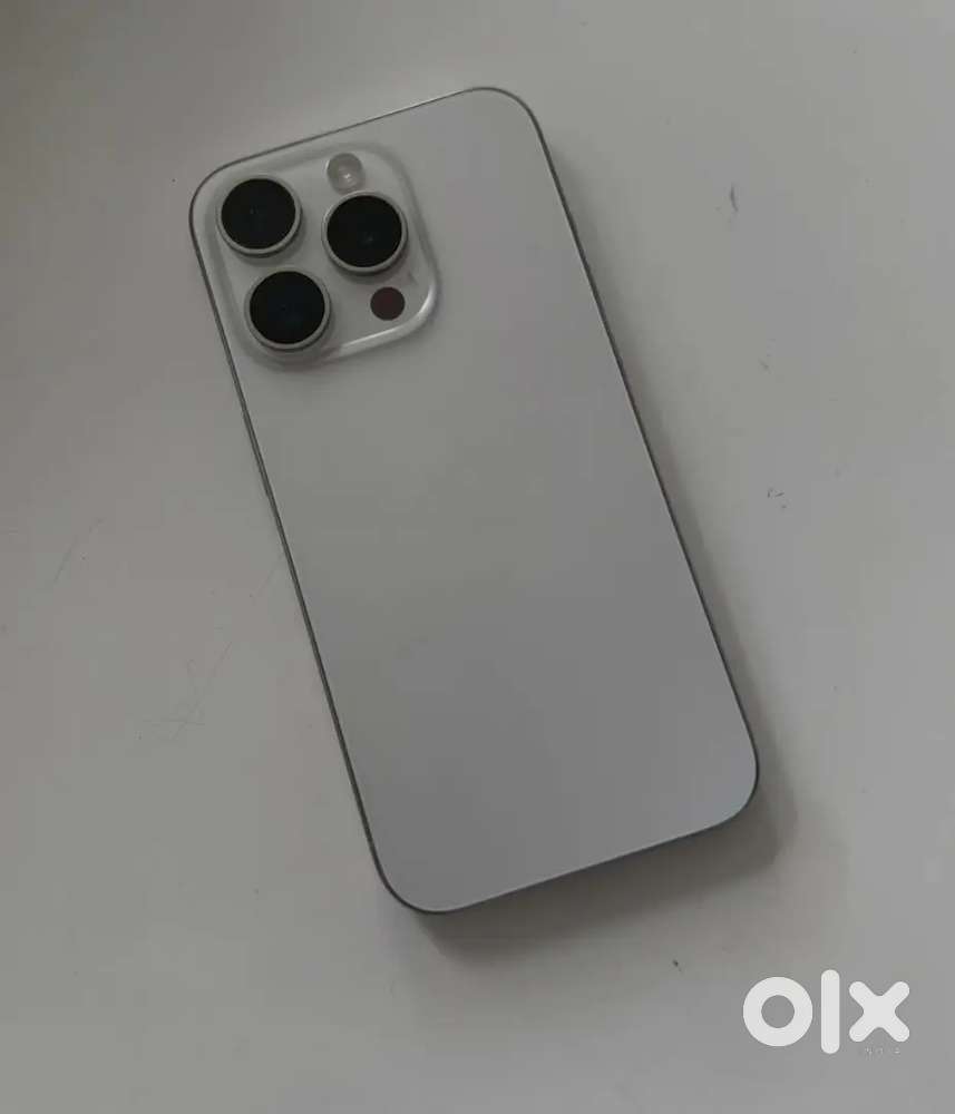 IPHONE 15 PRO 256GB IN WHITE TITANIUM UNDER WARRANTY WITH SCRATCHLESS
