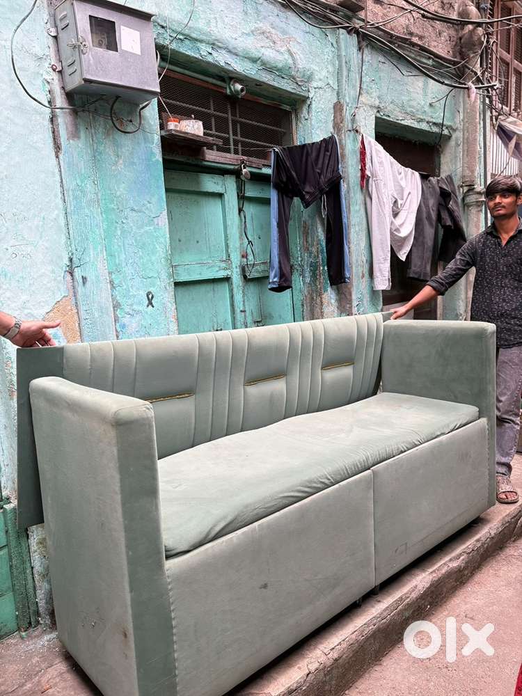 Grey velvet 3-seater sofa with stylish vertical turted backrest