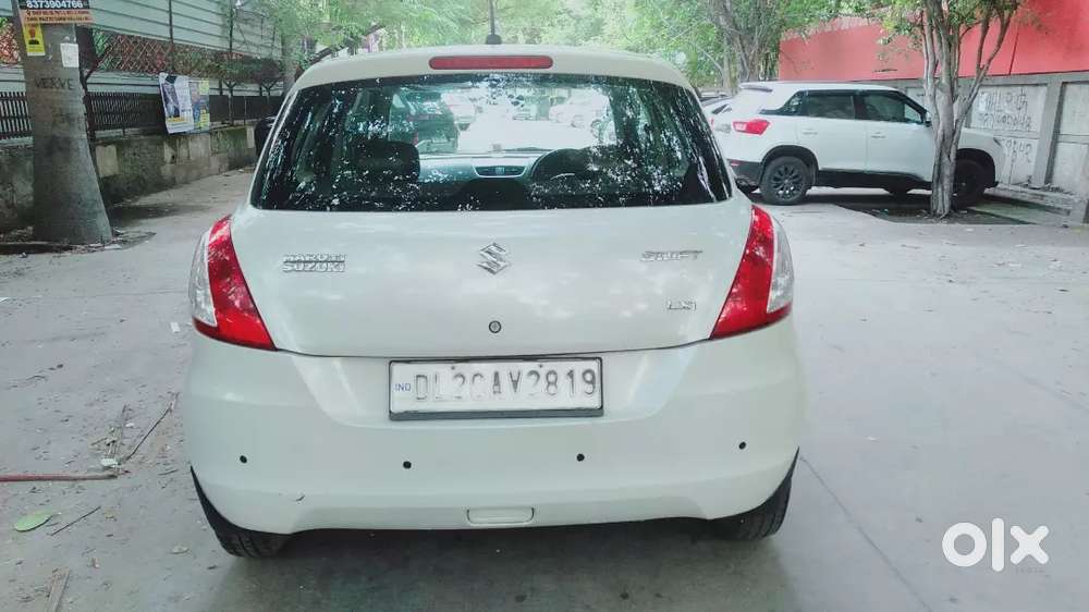 Maruti Suzuki Swift Lxi 2016