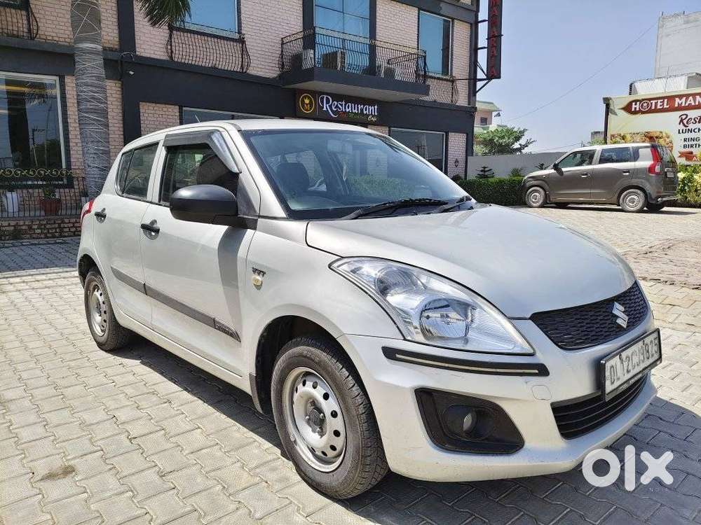 Maruti Suzuki Swift Lxi Optional-o, 2016, Petrol