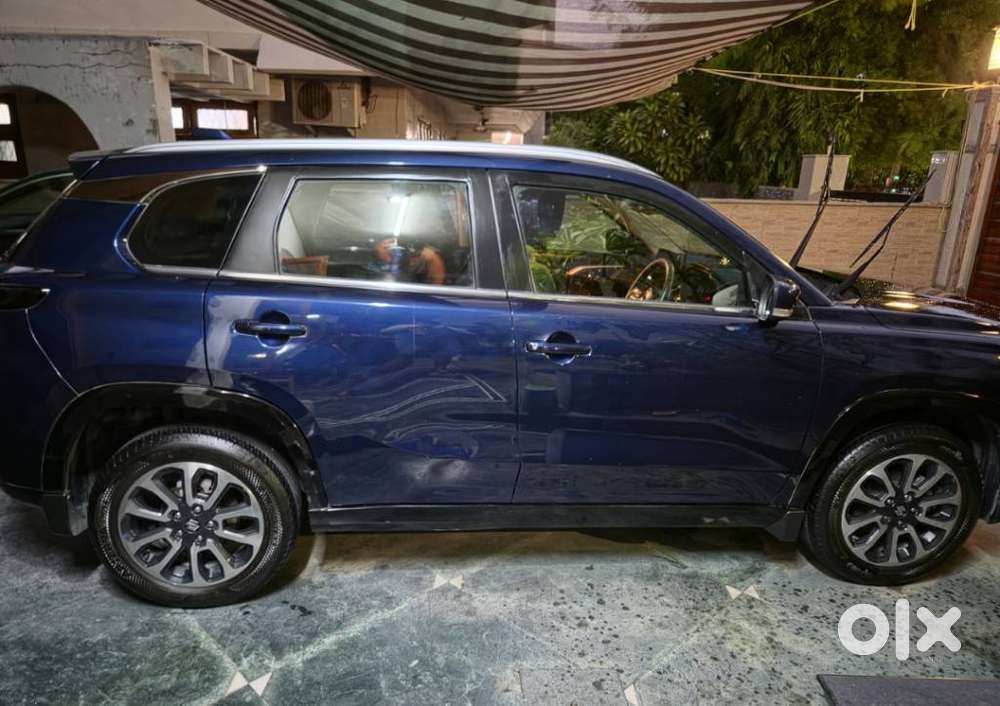 Maruti Suzuki Grand Vitara 1.5 Zeta Plus Dual Tone Intelligent Hybri..