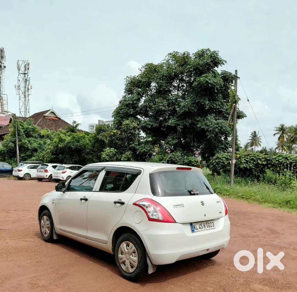 2013 Swift Petrol 2nd Owner 93000km