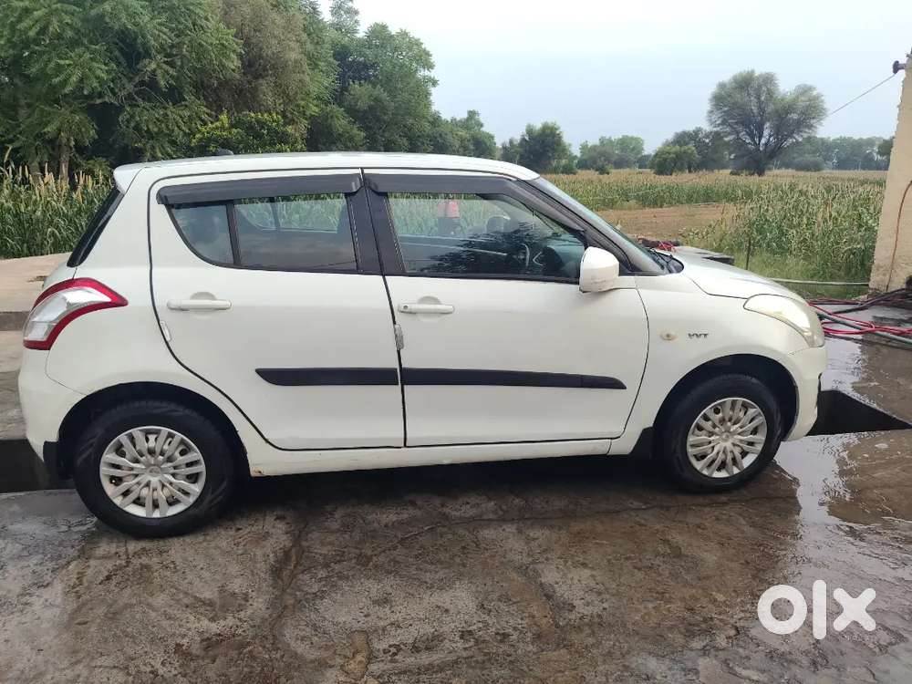 Maruti Suzuki Swift Lxi 2016