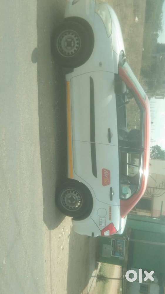 Maruti Dzire 1.2 Tour 2019 (red Taxi Attached)