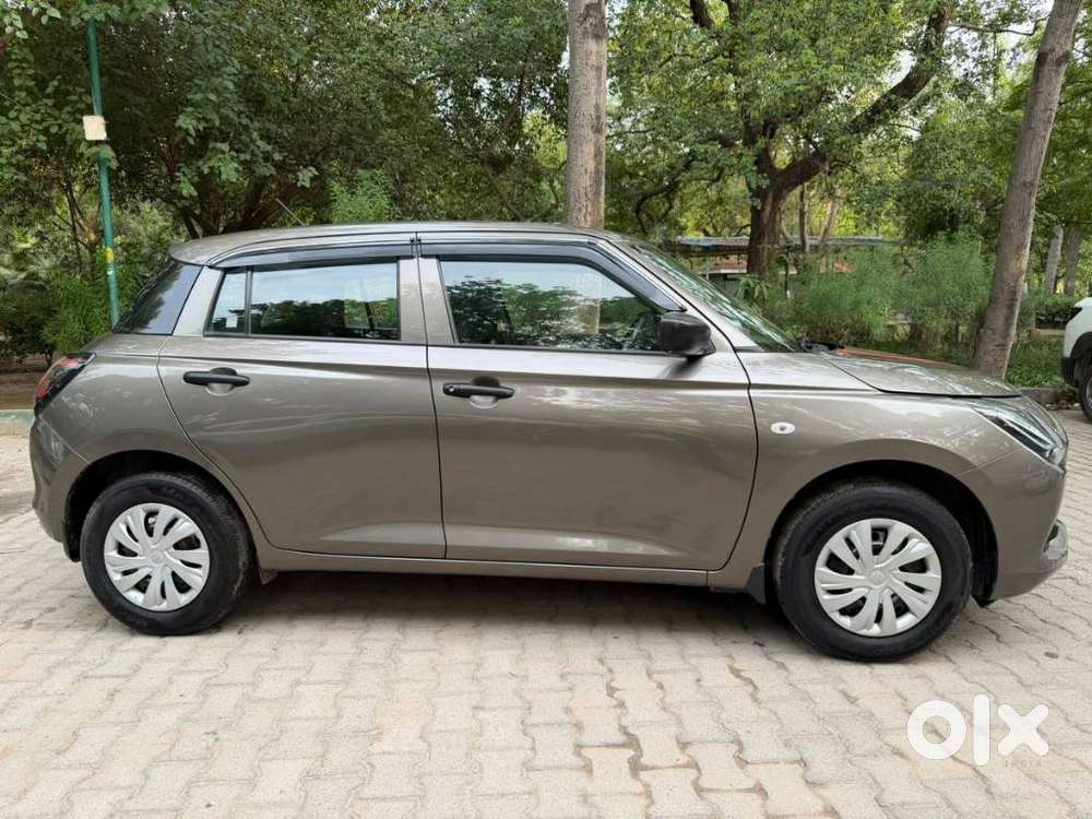 Maruti Suzuki Swift 1.2 Lxi (o), 2024, Petrol
