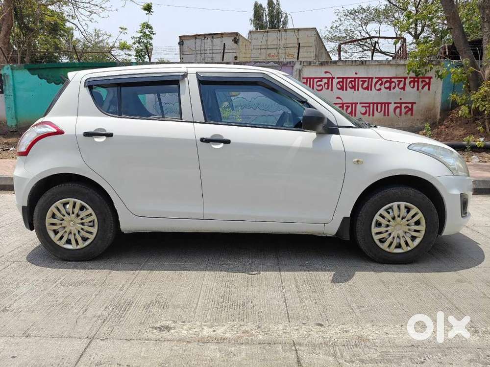 Maruti Suzuki Swift Lxi Optional-o, 2016, Petrol
