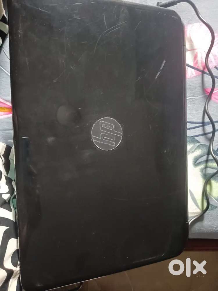 Brand of laptop isHp, model of laptop is HP 15Notebook PC, age 10 year