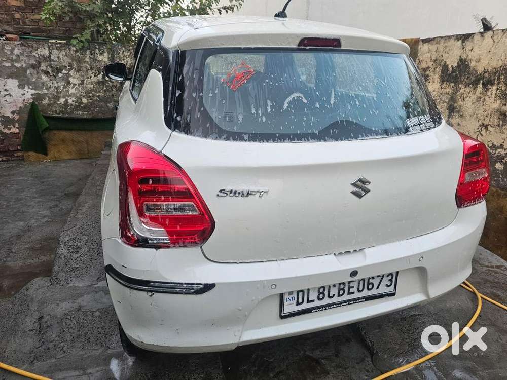 Swift , 2022, Petrol , White Color , 23200km Driven ,