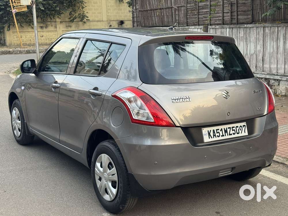 Maruti Suzuki Swift Lxi Optional-o, 2015, Petrol