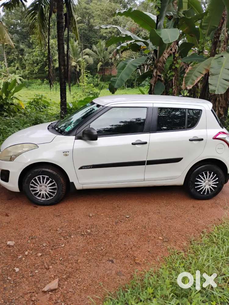 Maruti Suzuki Swift 2016 Lxi Optional-o