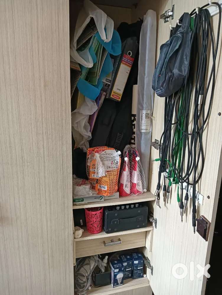 Wardrobe which can be split into two cupboards