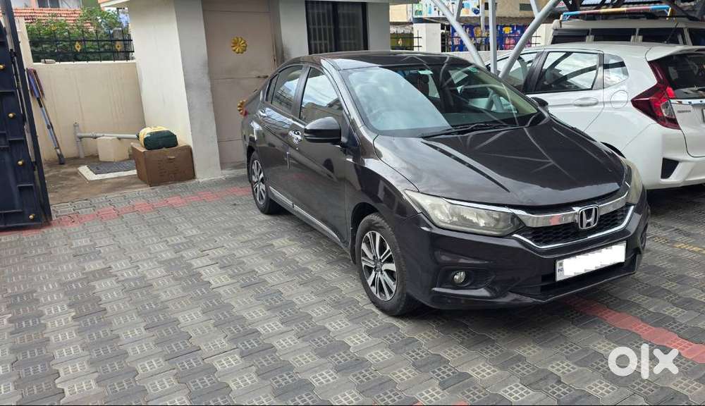 Honda New City V (petrol + Cng) Golden Brown