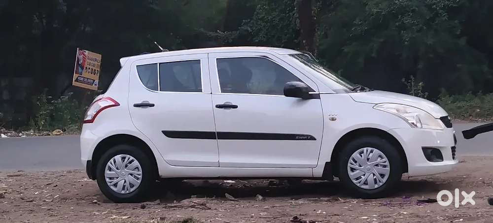 Maruti Suzuki Swift Lxi 2013