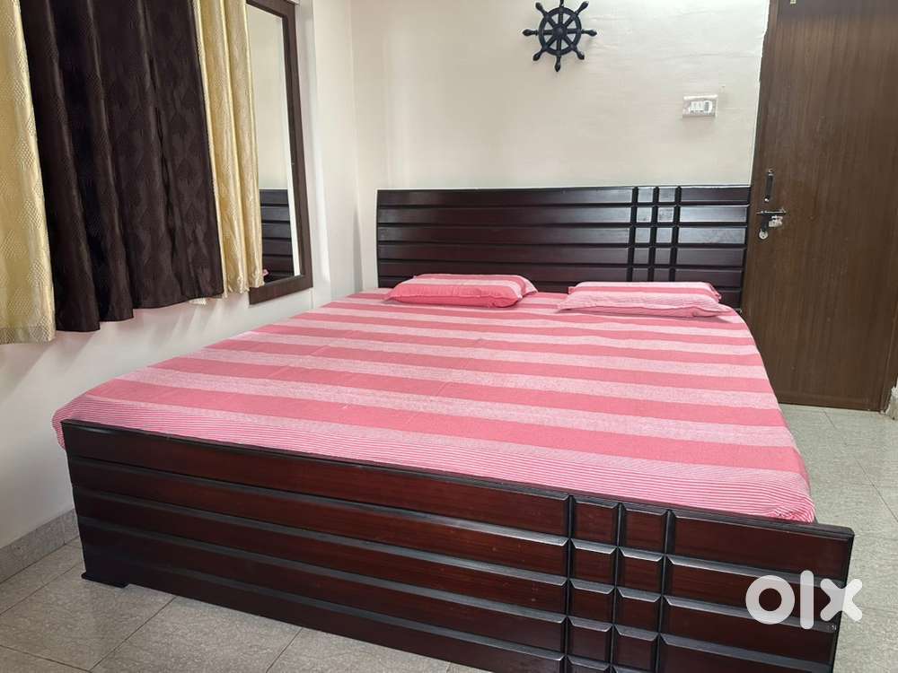 King size bed with mattress and dresser