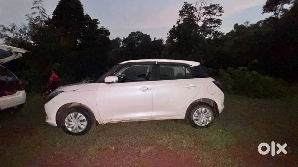 Maruti Swift Vxi Optional 2024