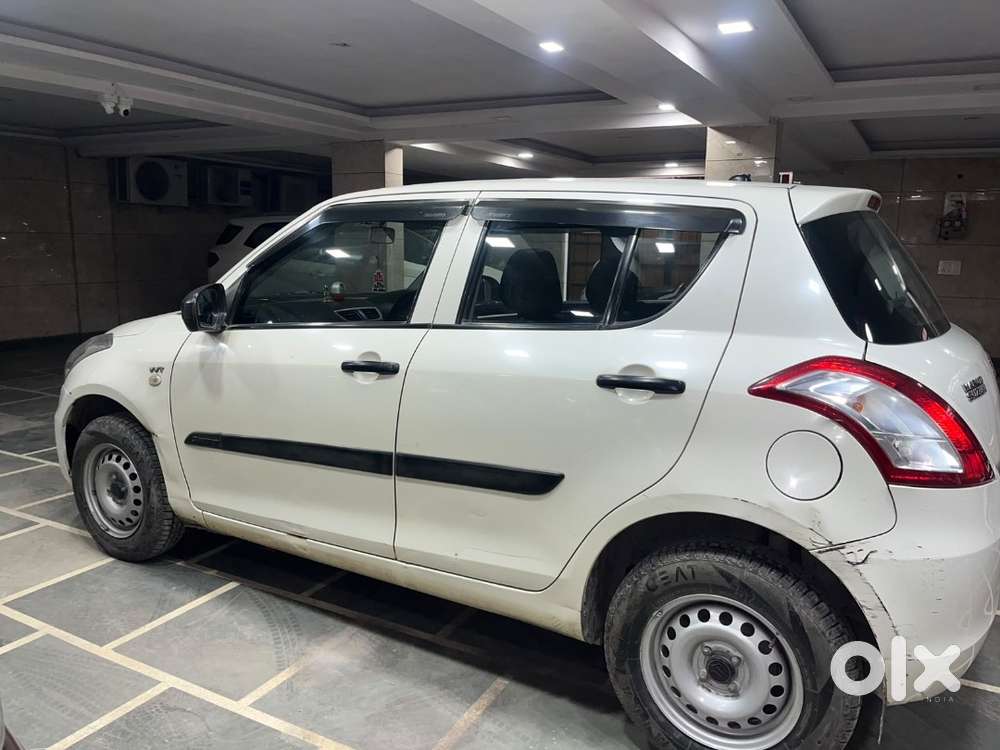Maruti Suzuki Swift Lxi 2015