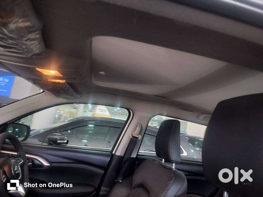 Maruti Suzuki Grand Vitara 1.5 Alpha Plus Intelligent Hybrid Ecvt, 2..