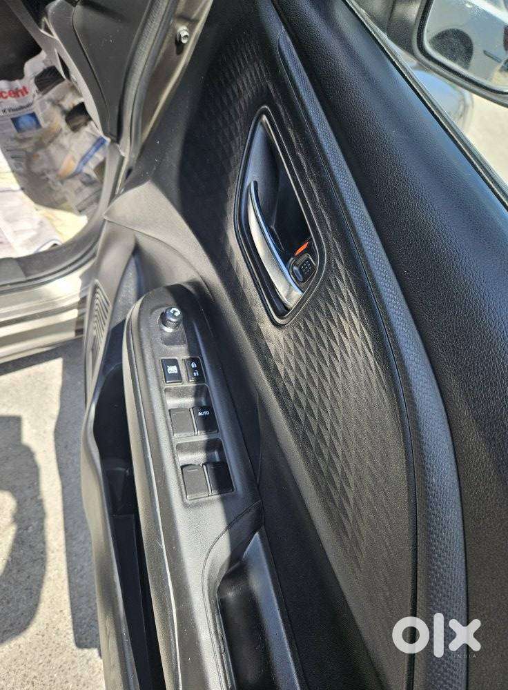 Maruti Suzuki Swift 1.2 Vxi (o), 2024, Petrol