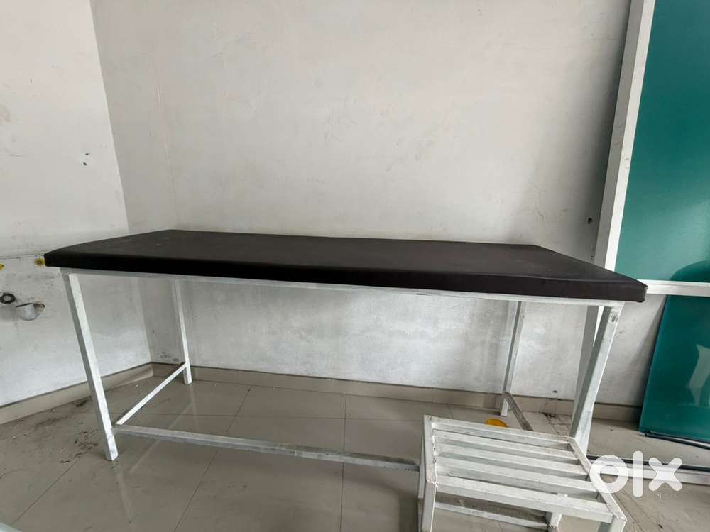 Examination bed and table (medical use)