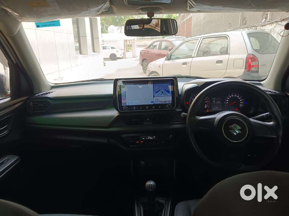 Maruti Suzuki Swift Lxi Optional-o, 2024, Petrol