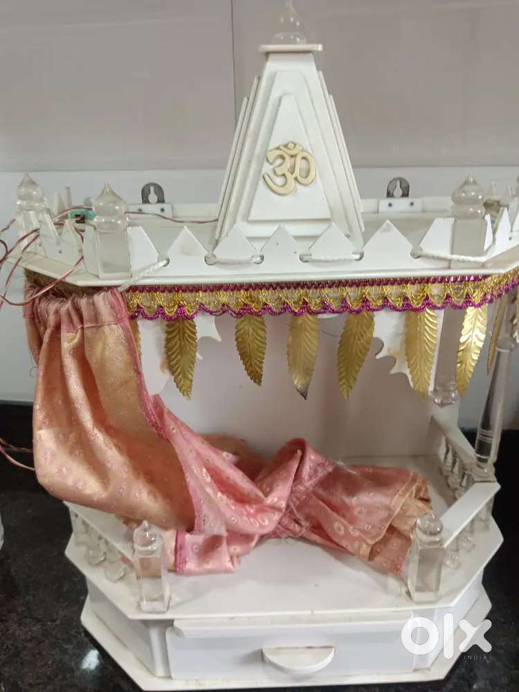 Beautiful White Home Mandir with Golden leaves