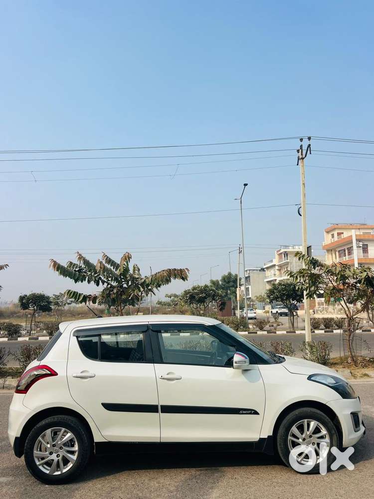 Maruti Suzuki Swift 1.2 Vxi (o), 2017, Petrol